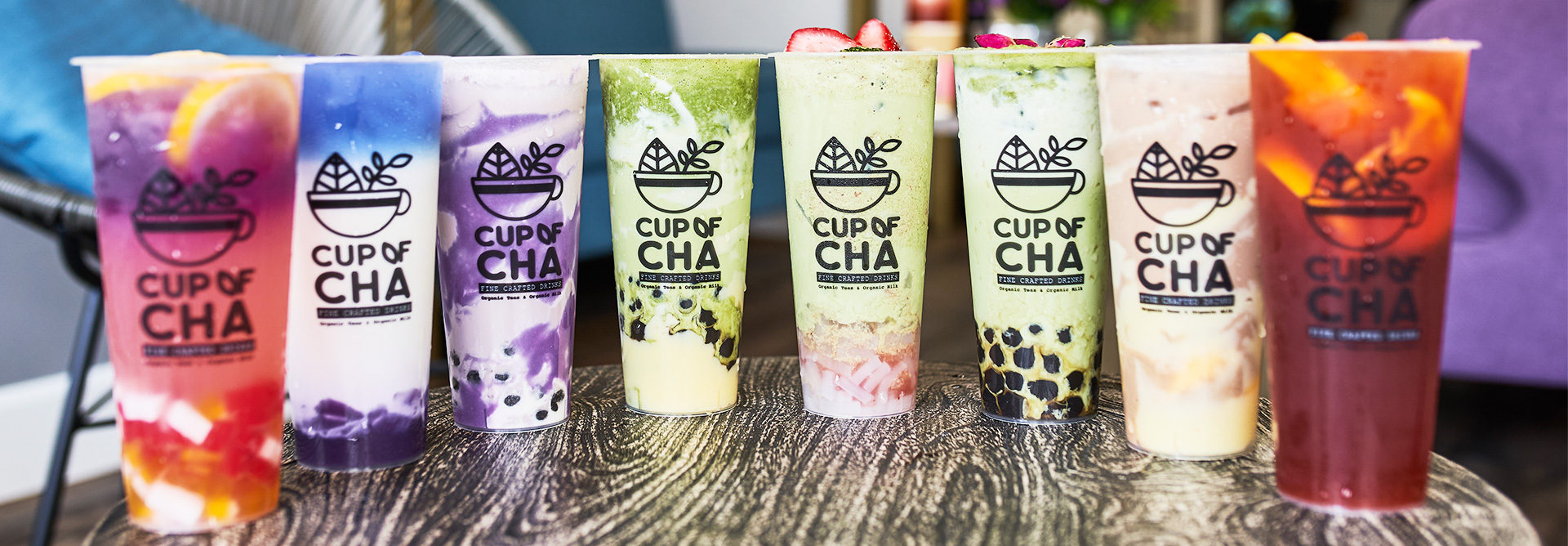 A banner showing a variety of iced drinks and boba